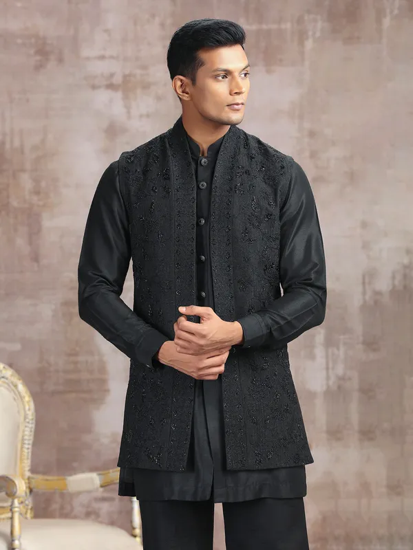 Black silk waistcoat set with thread work