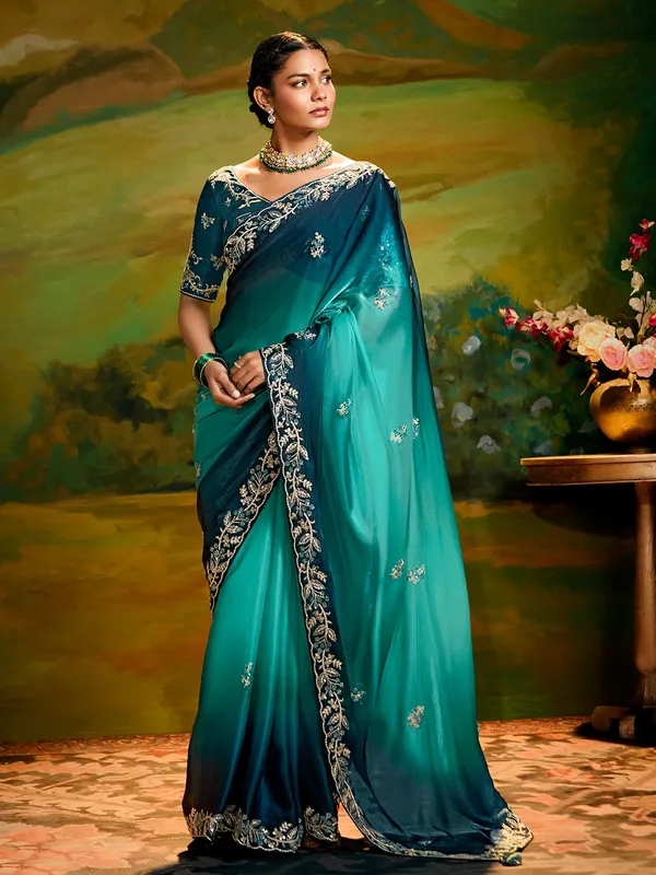 Blue satin silk saree with shaded pattern