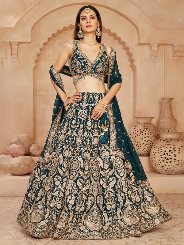 Bottle green wedding wear lehenga choli in georgette
