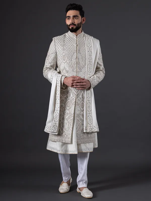 Breath taking pearl white sherwani in silk for groom