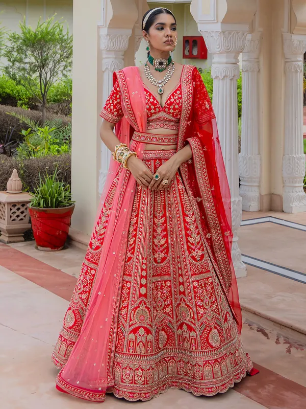 Bridal red silk lehenga choli with rich embellishment