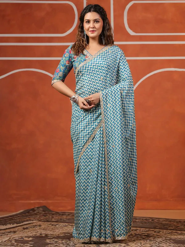 Bright blue printed muslin saree for festive