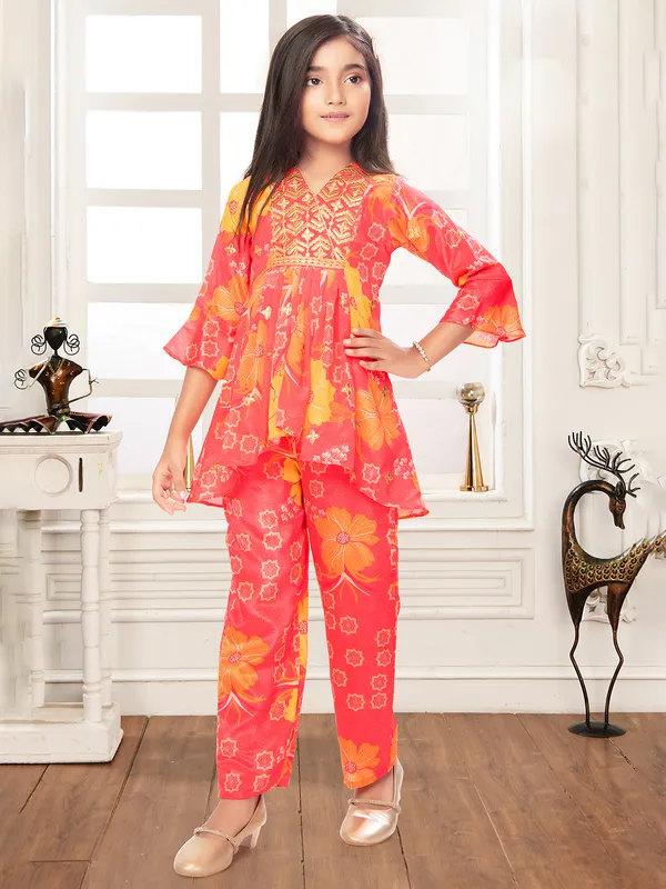 Bright red printed silk salwar suit