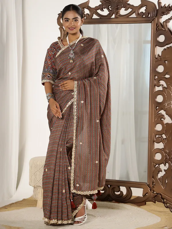 Brown printed festive style muslin saree