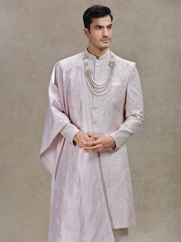 Charming pink silk sherwani with ornated dupatta