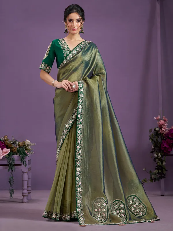 Classy green tissue silk saree for wedding
