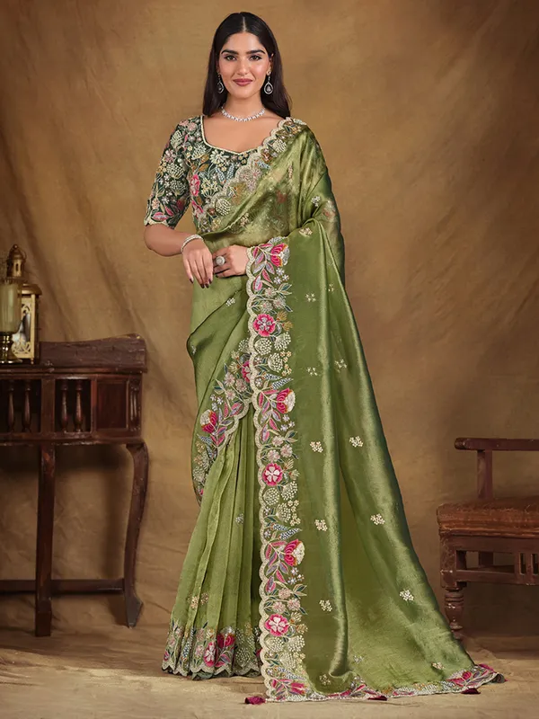 Classy pista green tissue silk saree for wedding