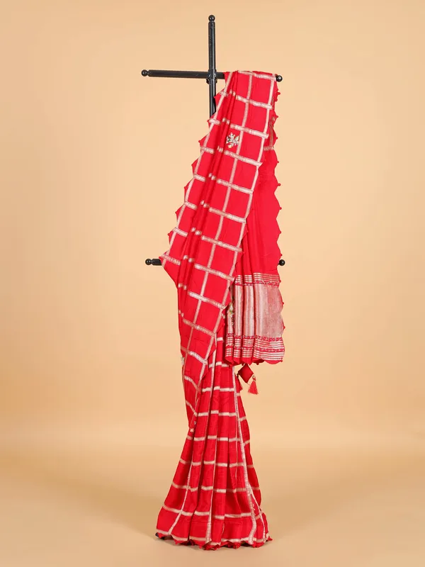 Classy red silk saree with contrast red blouse