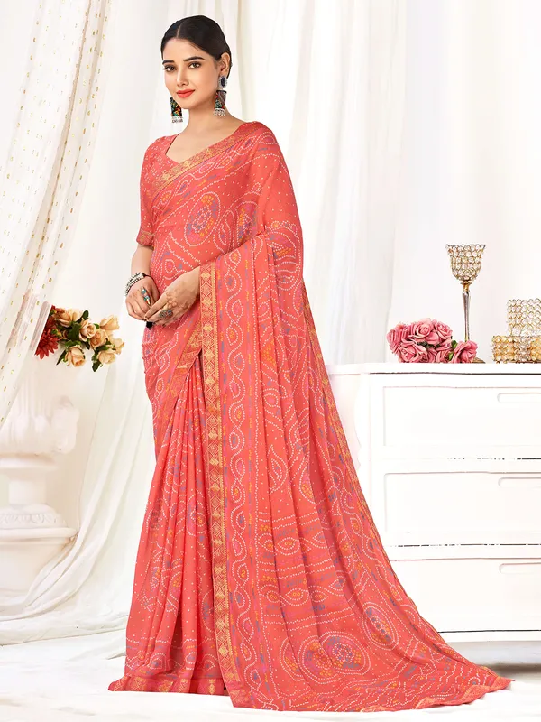 Coral pink chiffon printed saree