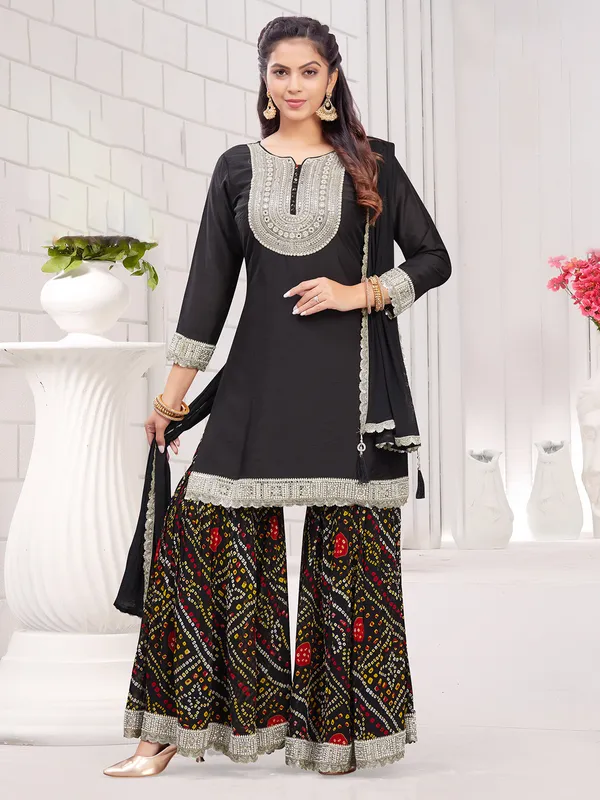 Cotton silk black sharara suit with dupatta