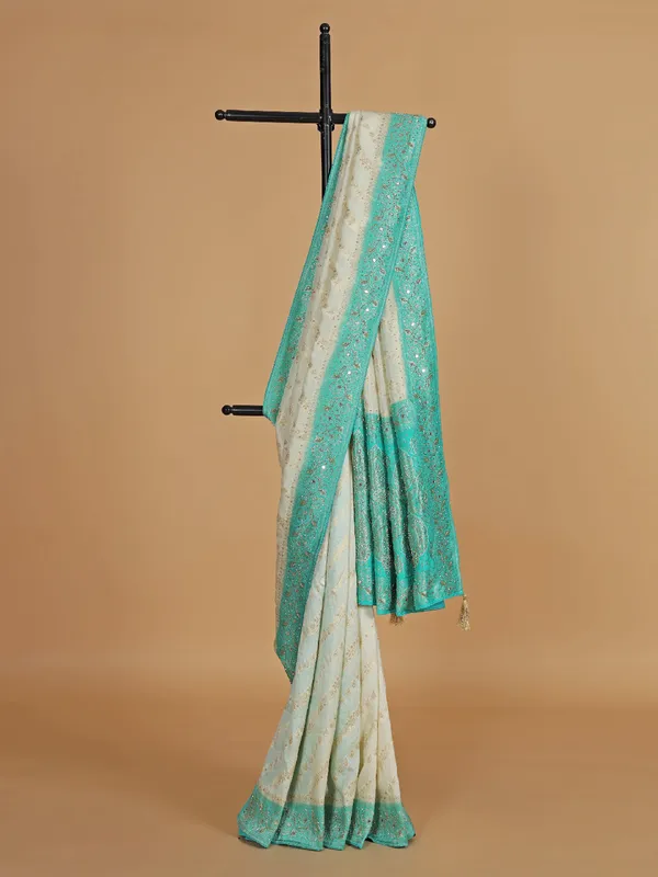 Cream and aqua dola silk wedding wear saree
