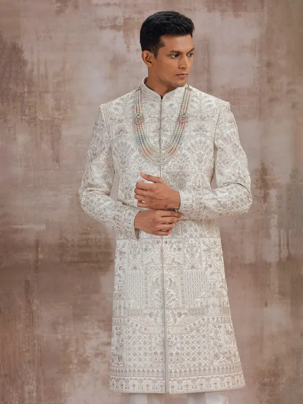 Cream art silk wedding sherwani for groom