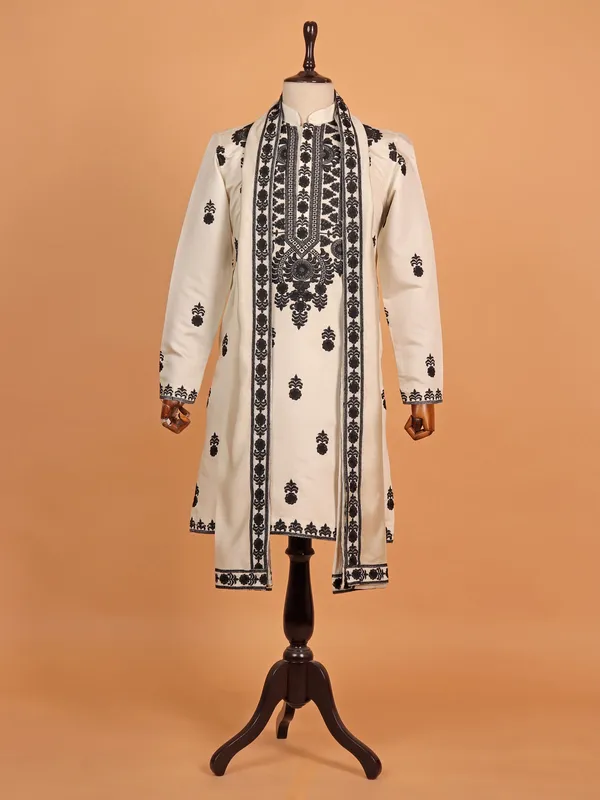 Cream coloured black embroideried pathani suit