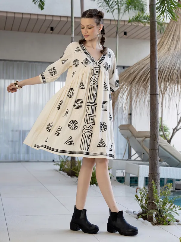 Cream cotton printed kurti with V neck