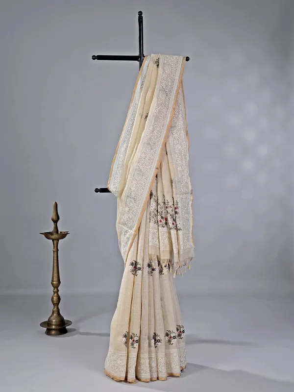 Cream cotton silk saree with embroidered elegance