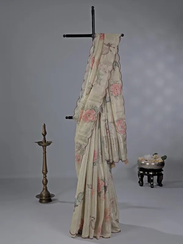 Cream cotton silk saree with printed details