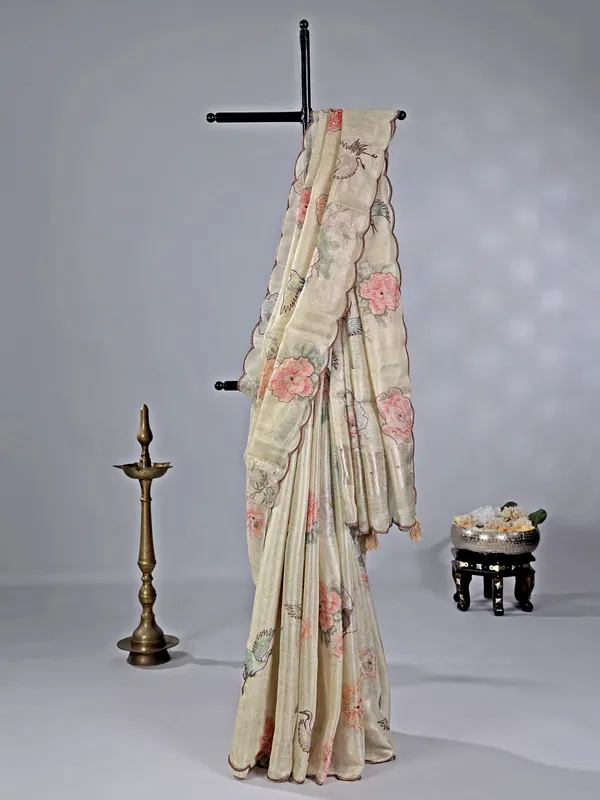 Cream cotton silk saree with printed details