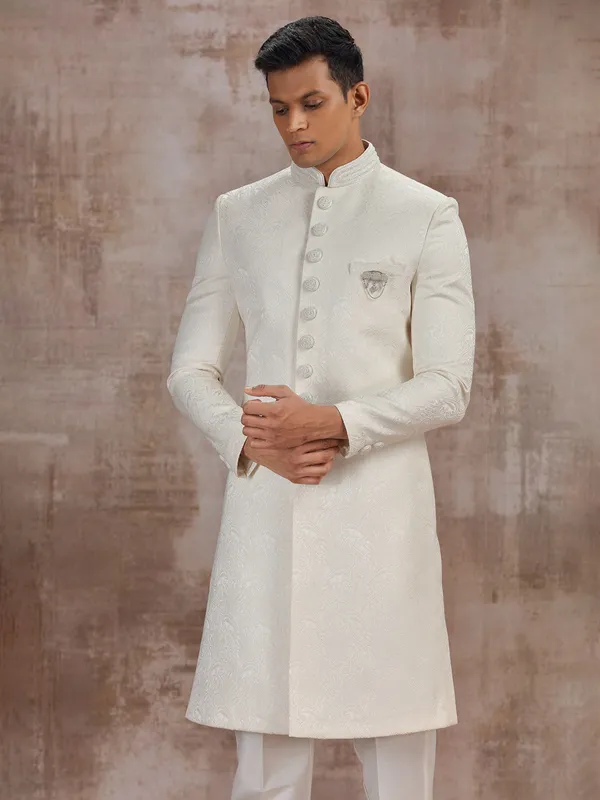 Cream jacquard sherwani for grooms wedding