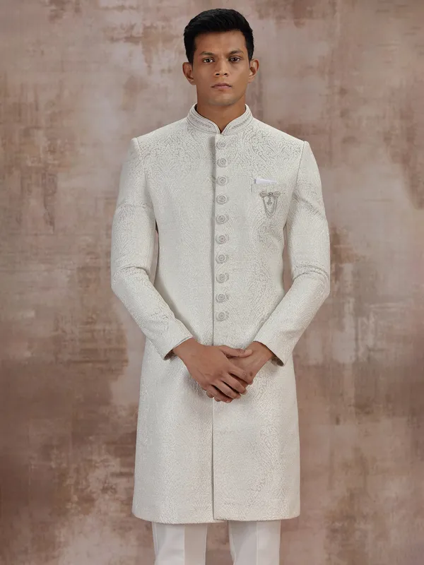 Cream jacquard wedding sherwani for groom