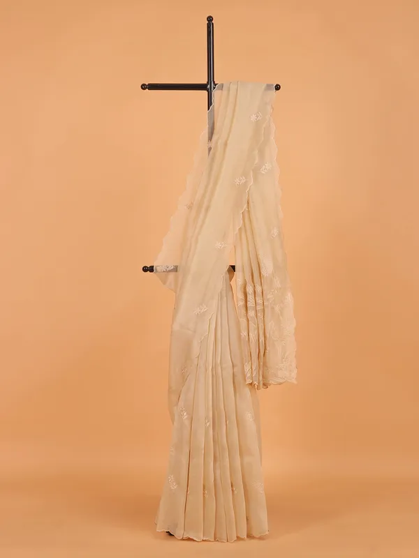 Cream organza saree with unstitched blouse