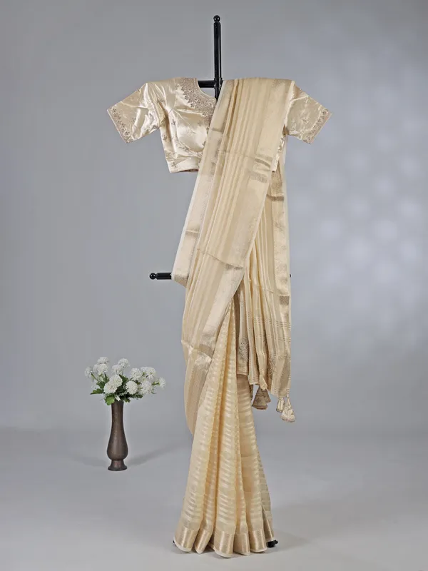 Cream organza satin silk saree with zardosi work