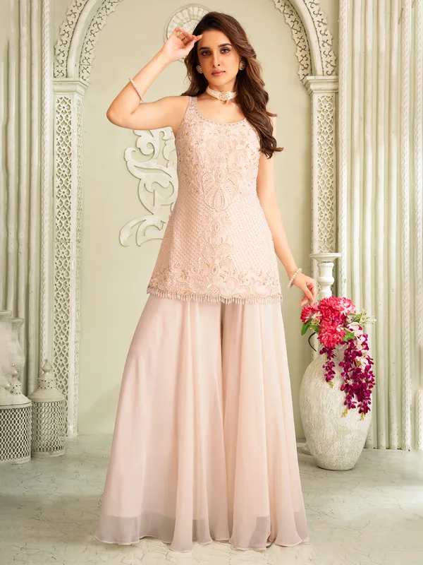 Cream pakistani georgette palazzo suit with thread work