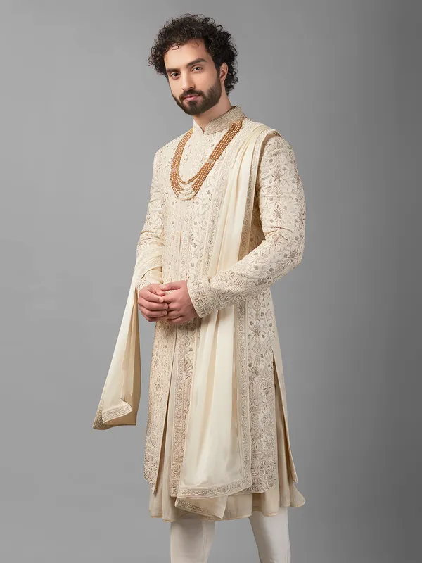 Cream peshwai style sherwani for groom