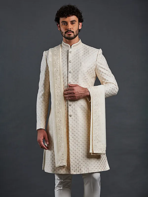 Cream raw silk groom style sherwani
