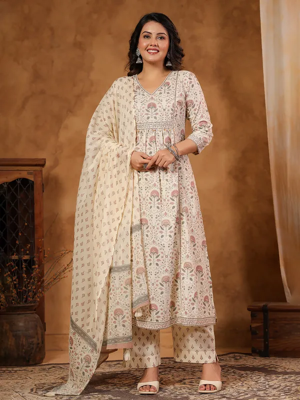 Cream silk kurti set with coin and aabla work
