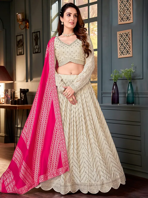 Cream silk lehenga choli with sequins work