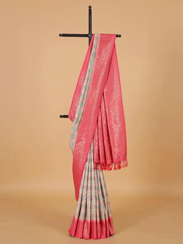 Cream silk saree with bold pallu