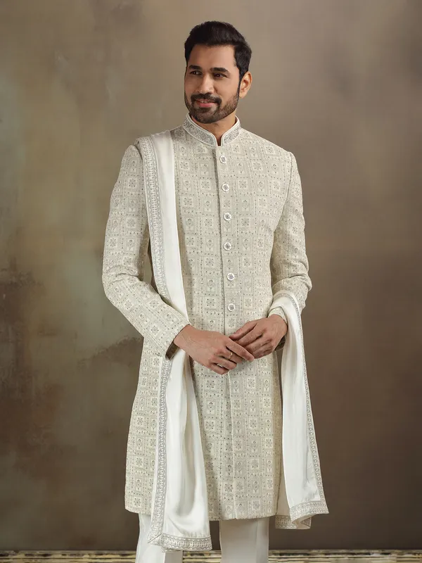Cream silk sherwani with beautiful weaving