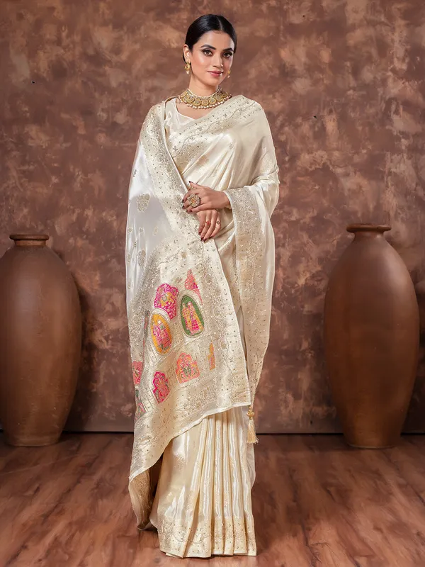 Cream tissue silk wedding wear saree
