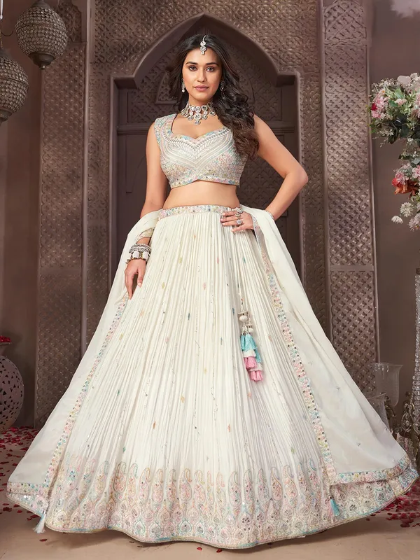 Cream wedding lehenga choli with sequins work