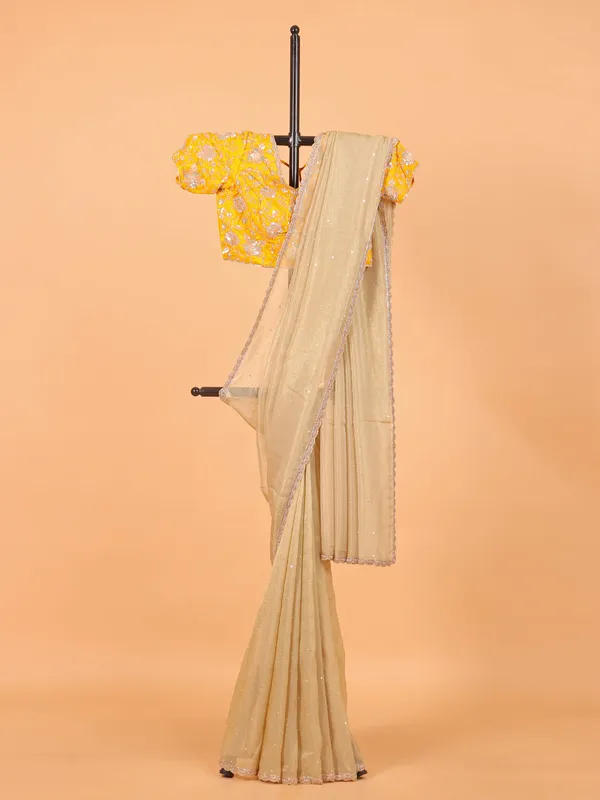Cream wedding wear saree in organza