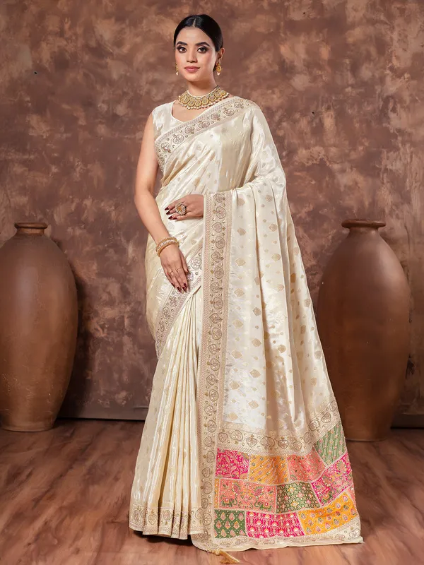 Cream wedding wear saree in tissue silk