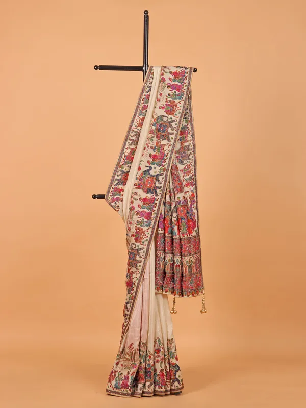 Cream wedding wear saree in zari weaving