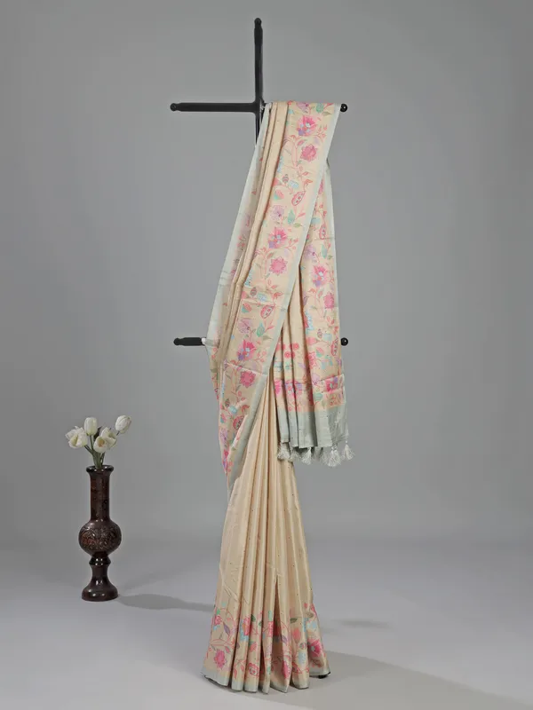 Cream zari woven silk saree with florals printed