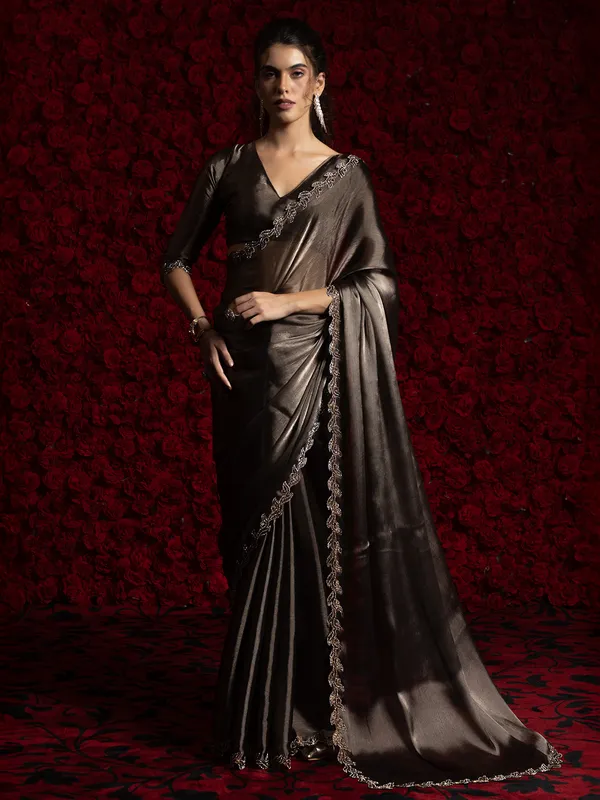 Dark brown chiffon saree with stone embellishment
