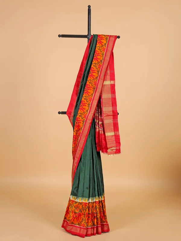 Dark green bandhej printed silk saree