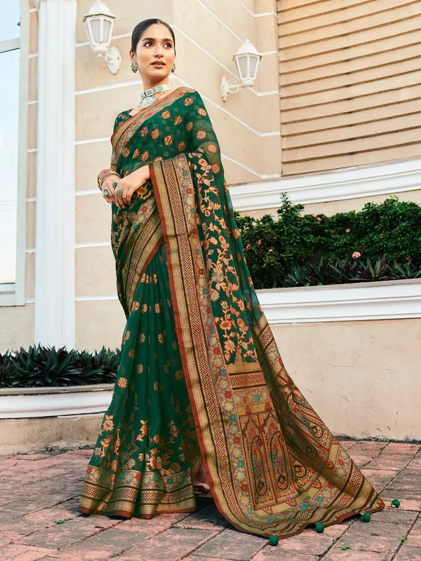 Dark green festive georgette saree