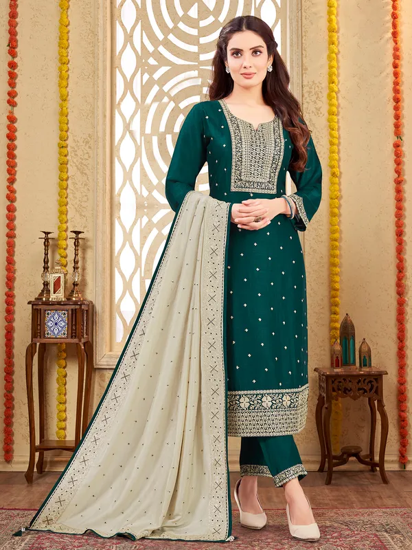 Dark green festive wear silk salwar suit