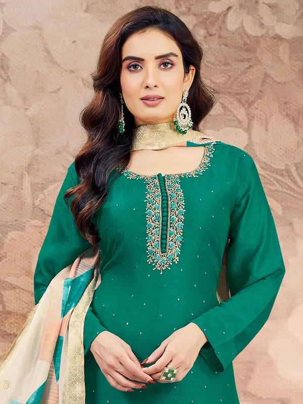Dark green sequins worked salwar suit