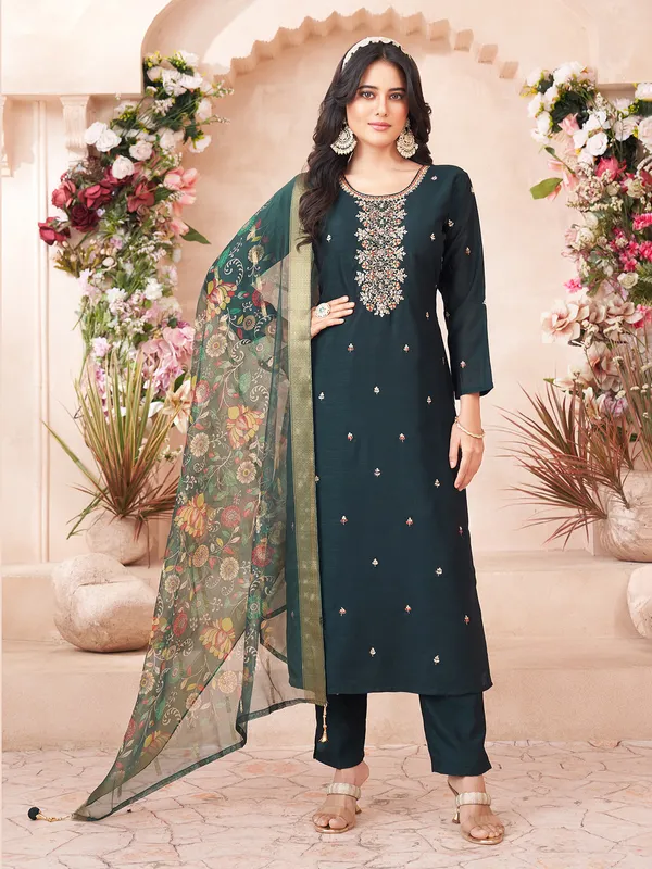 Dark green silk salwar suti with printed dupatta