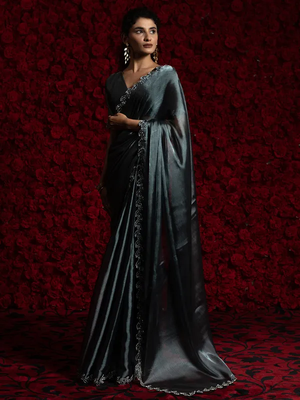 Dark grey chiffon saree with cutdana work