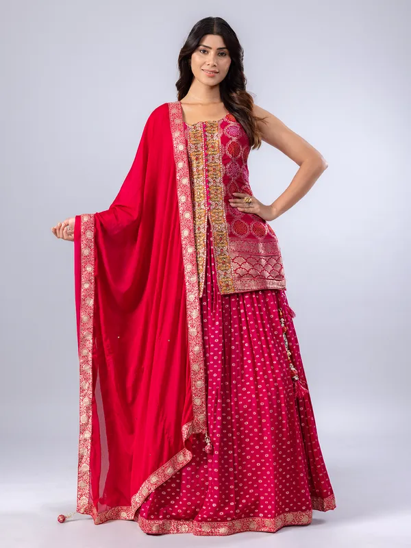 Deep pink zari worked silk lehenga suit