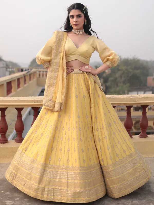 Delightful yellow raw silk lehenga choli