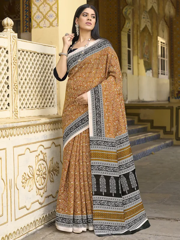 Earthy orange printed bhagalpuri silk saree