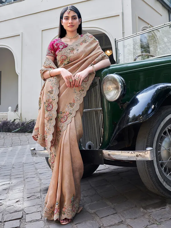 Elegant beige tissue silk saree