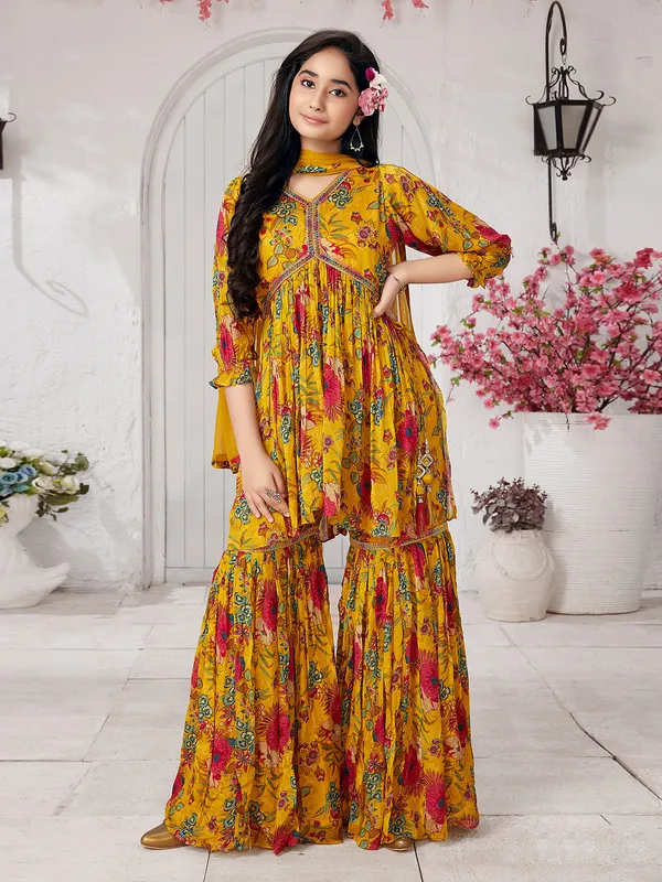 Elegant bright yellow georgette sharara suit